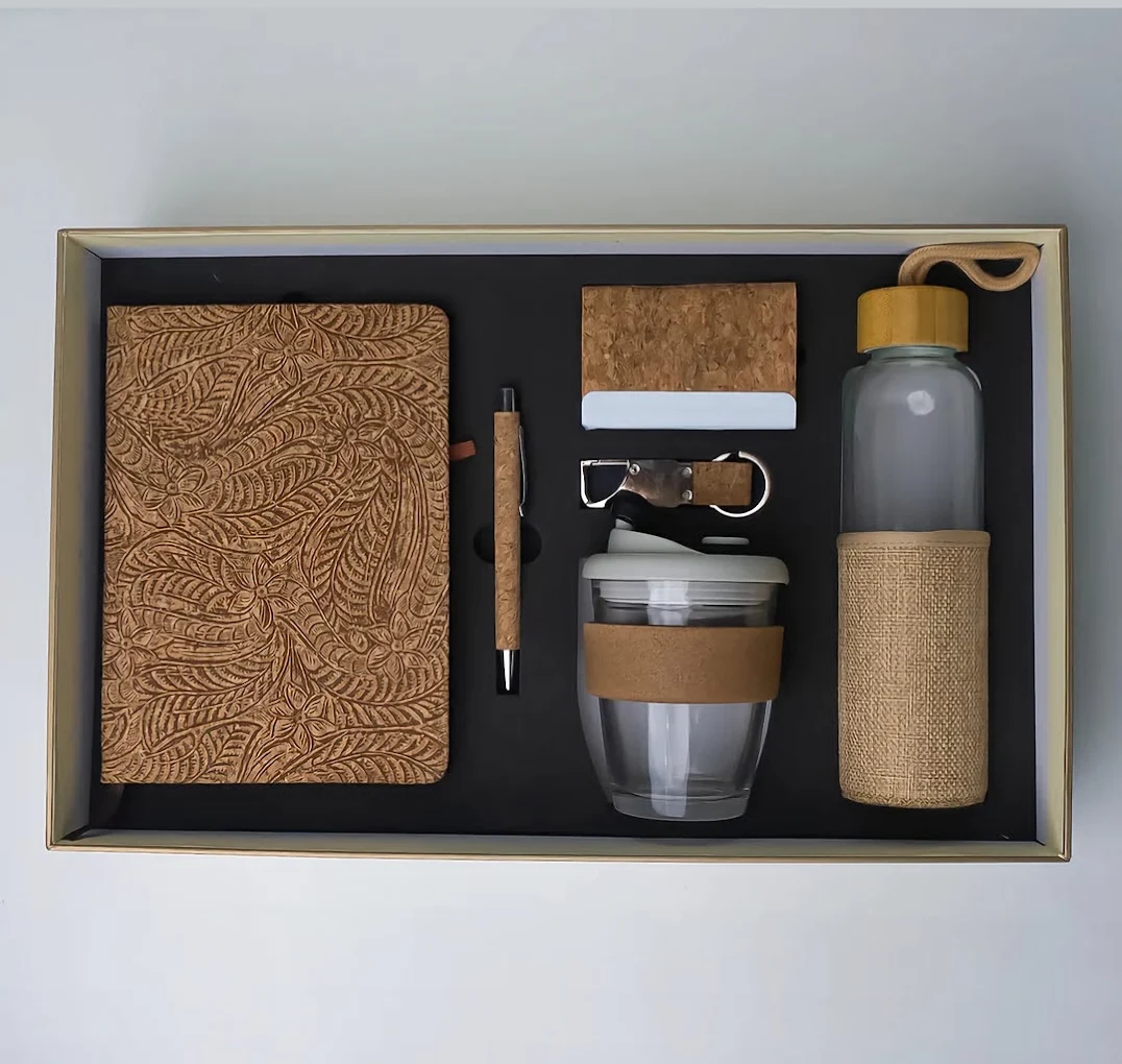 Branded corporate merchandise including bottles and notebooks